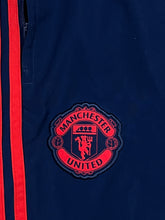 Load image into Gallery viewer, vintage Adidas Manchester United trackpants {M-L}
