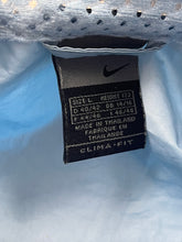 Load image into Gallery viewer, vintage Nike babyblue windbreaker {L}
