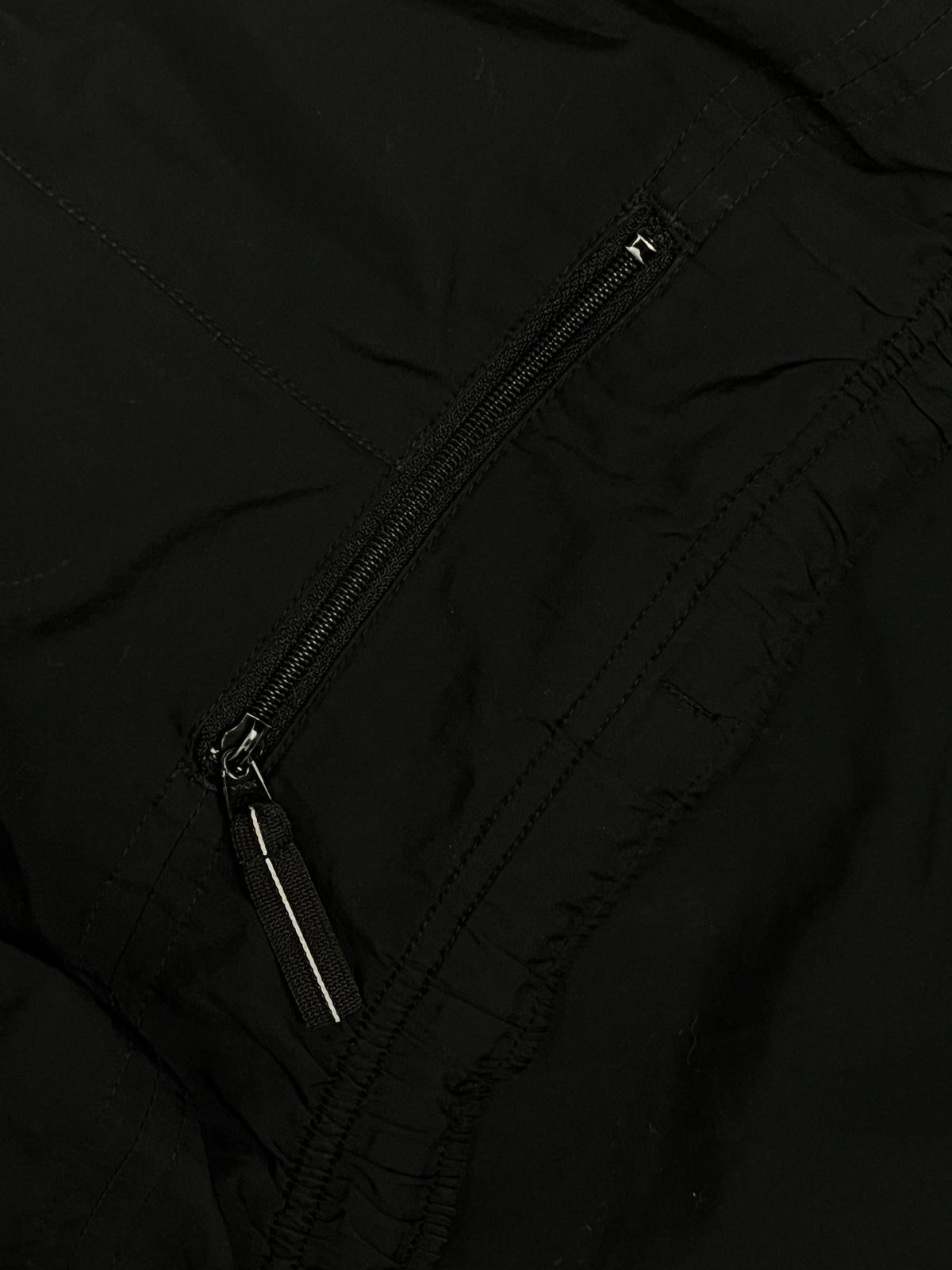 vintage Nike Trackpants {L}