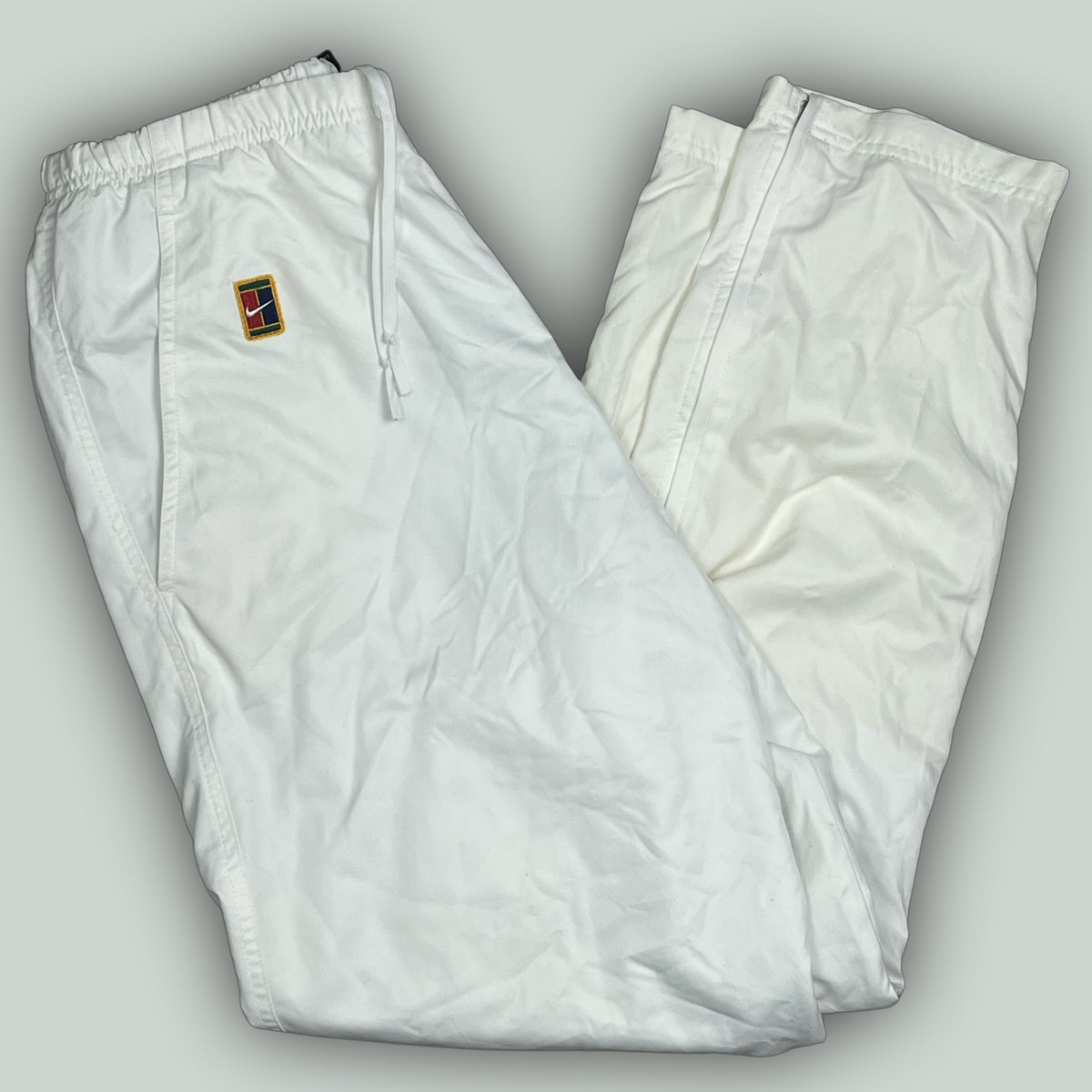 vintage Nike Court trackpants {M-L}
