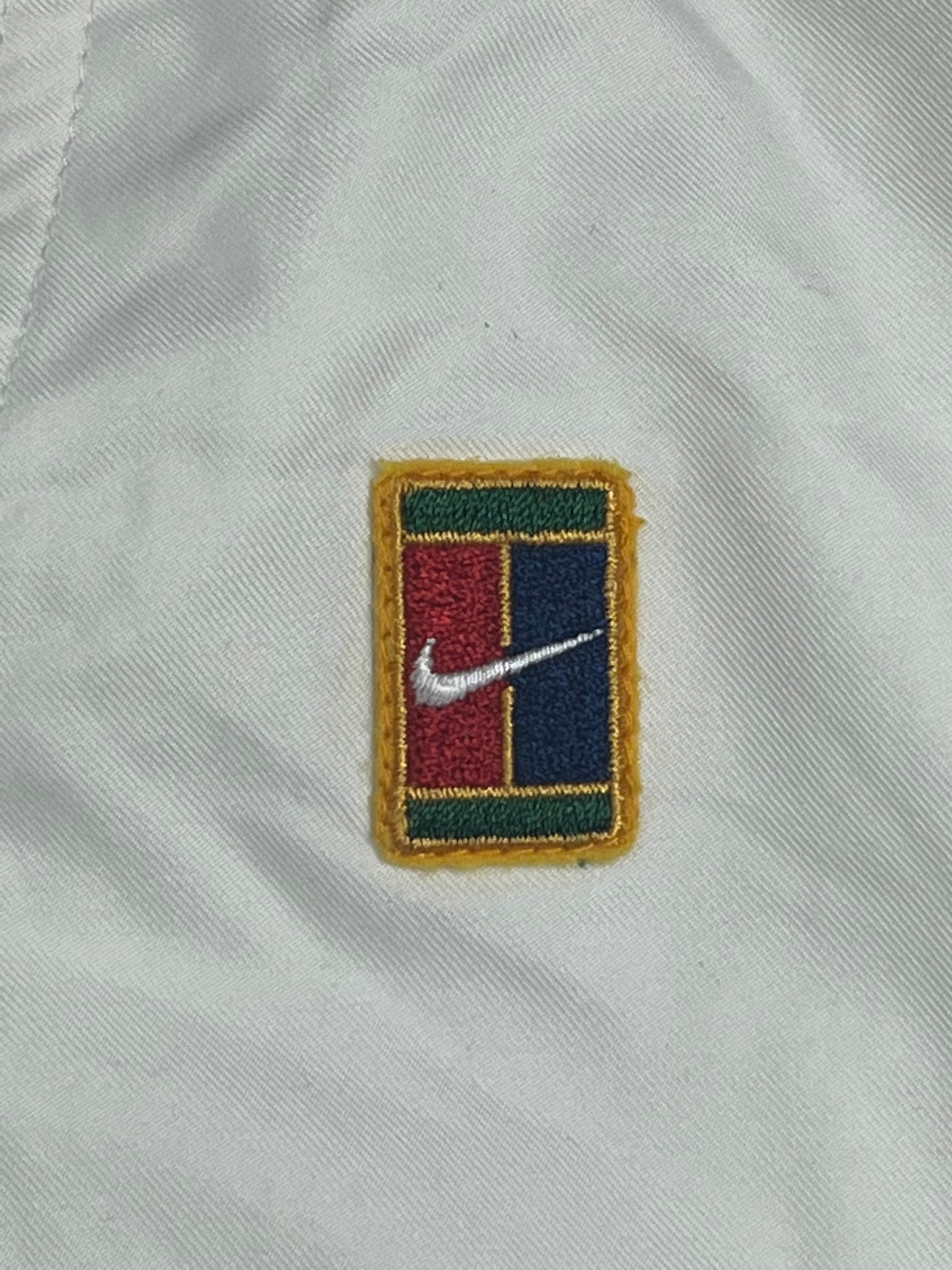 vintage Nike Court trackpants {M-L}