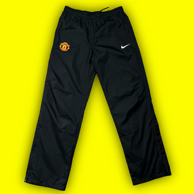 vintage Nike Manchester United trackpants {S}