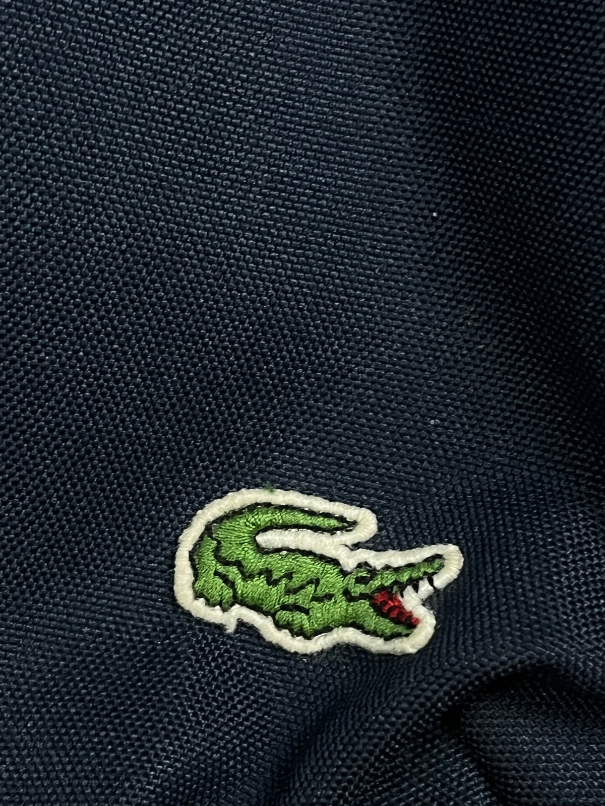 vintage Lacoste slingbag