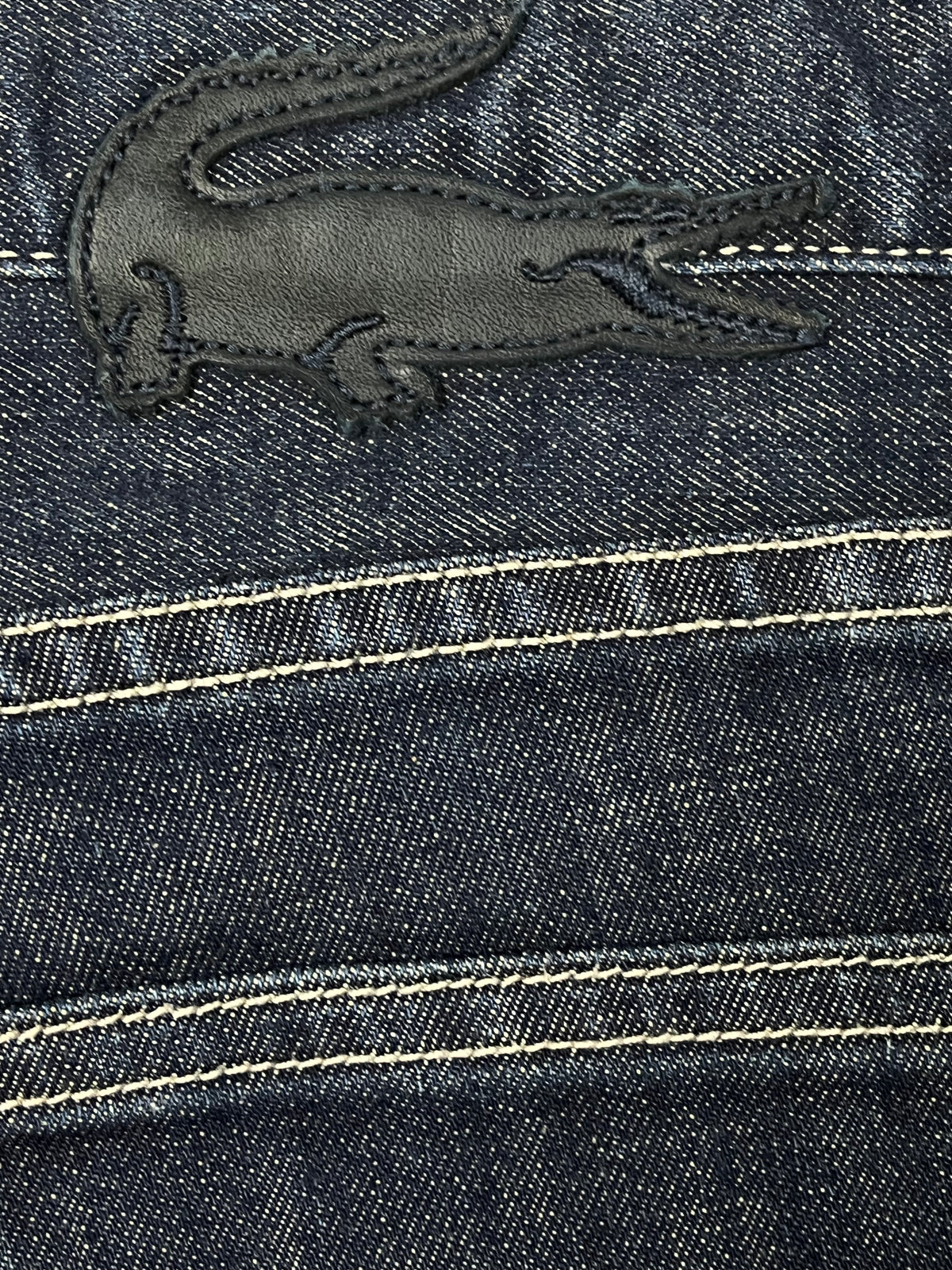 vintage Lacoste jeans with patch