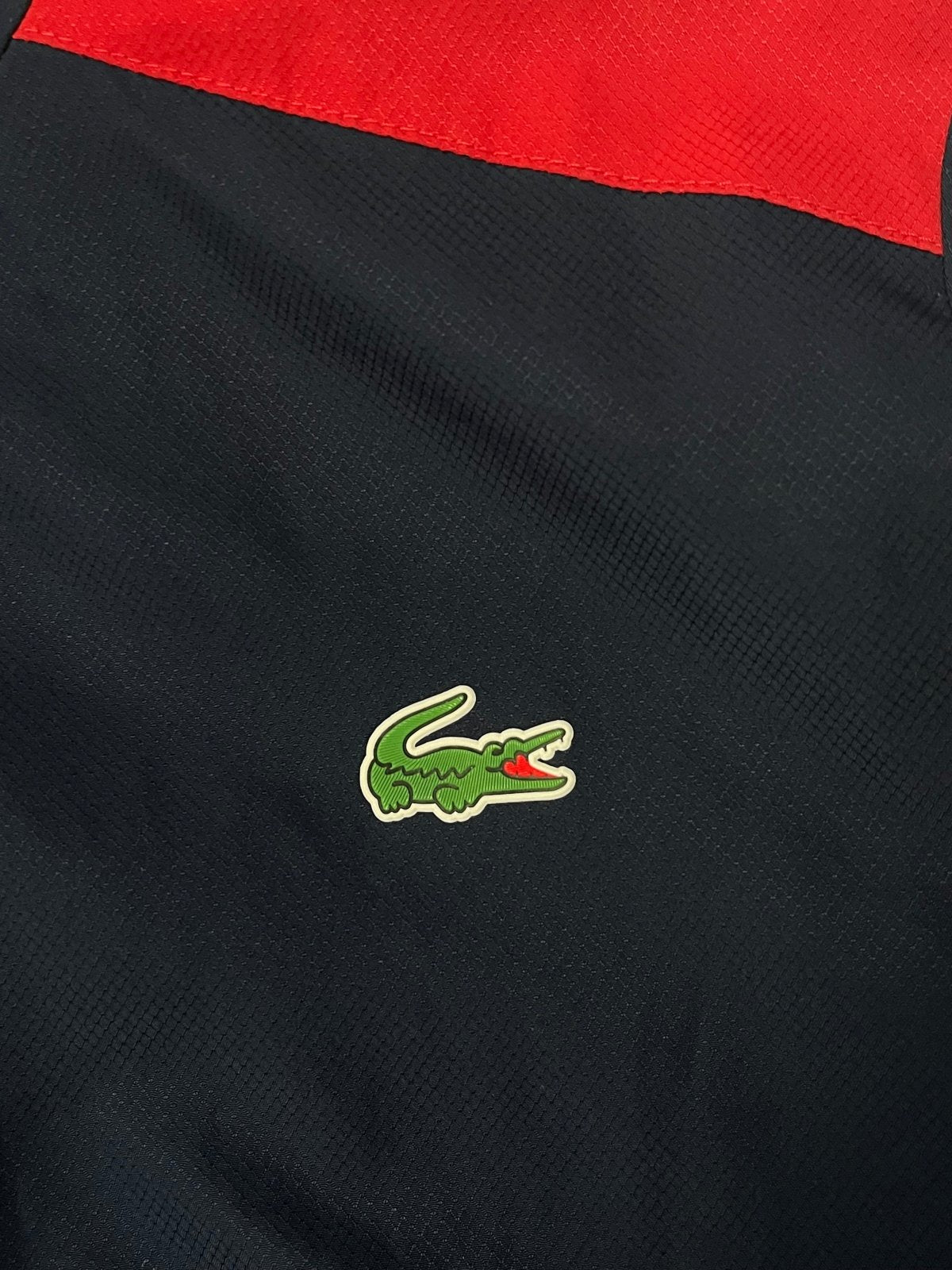 Lacoste windbreaker {S-M} - 439sportswear