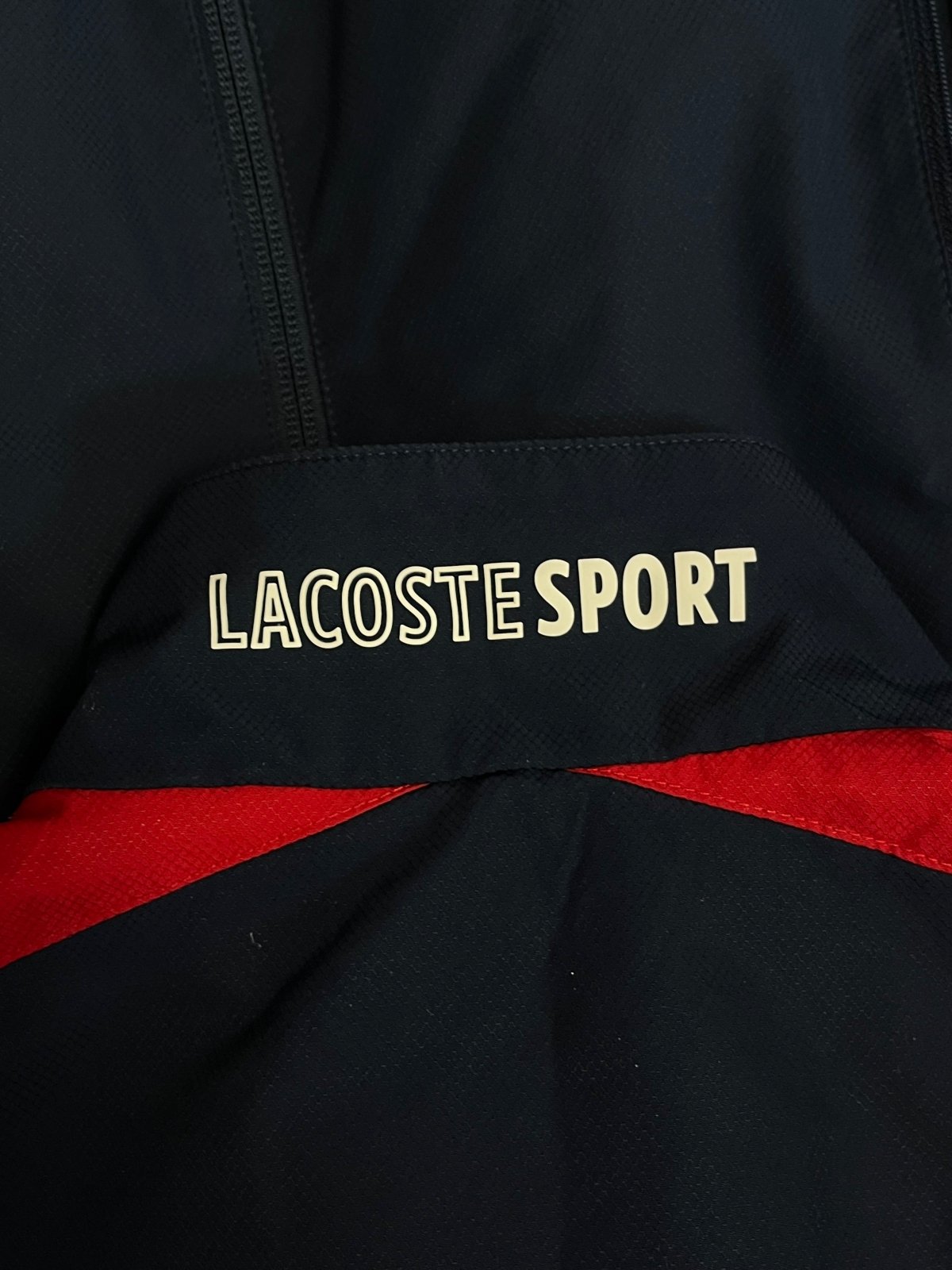 Lacoste windbreaker {S-M} - 439sportswear