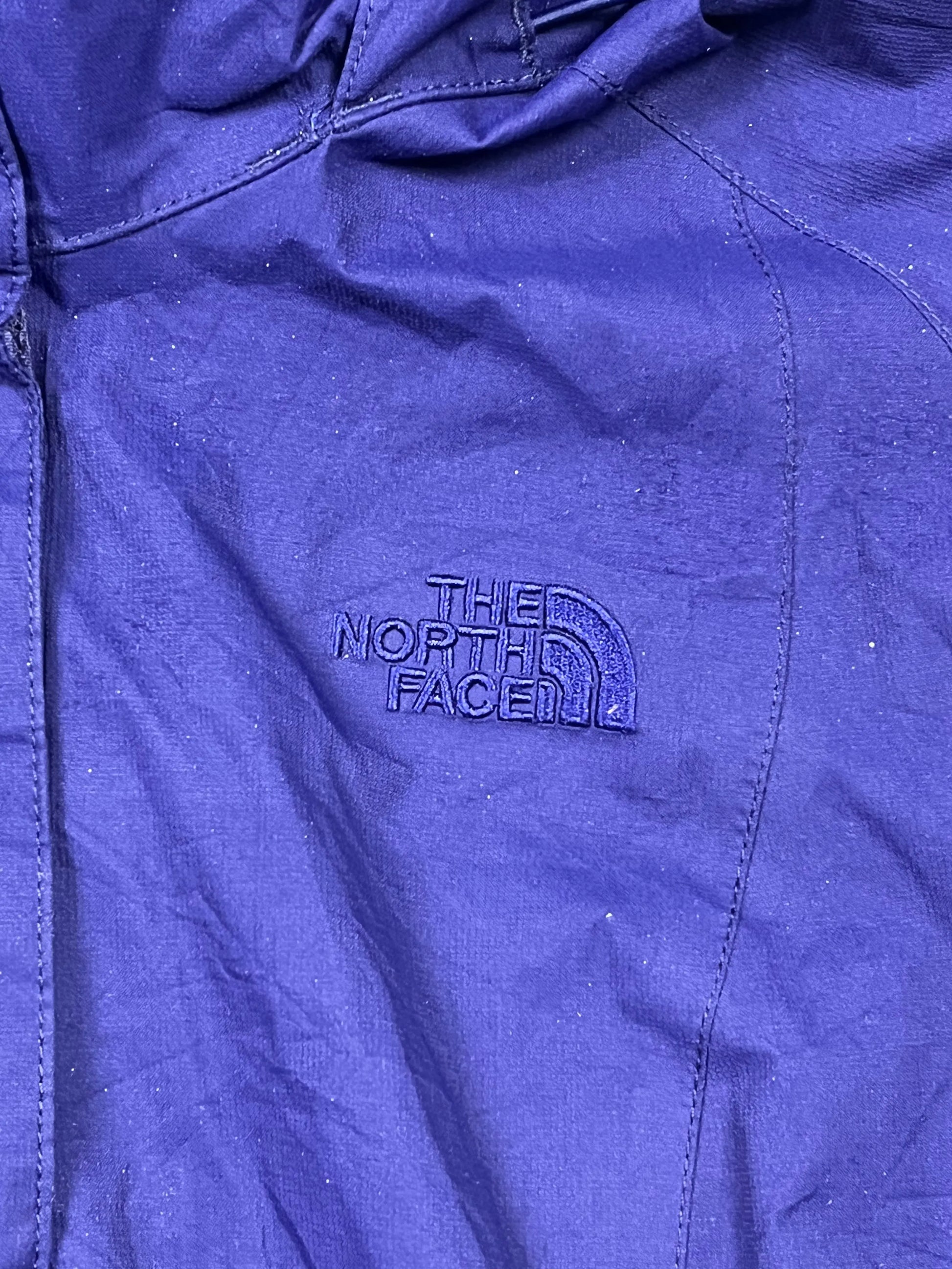 purple The North Face windbreaker The North Face